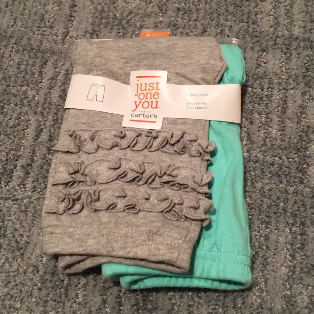 NWT Carter’s 2-pack pants. Size 9 months.